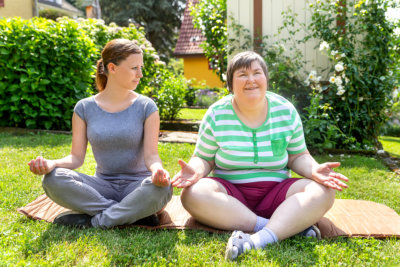 two ladies sitting outdoor