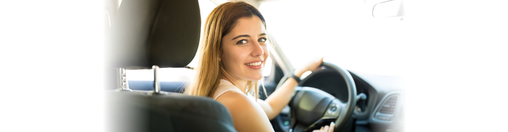 Beautiful woman driving her car